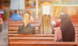 Girls or People praying in a church