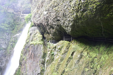 Pailon del Diablo - Mountain river and waterfall in the Andes. Banos