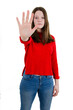 © Jelena Ivanovic - Stop gesture. Strict teenage girl in red sweater raises hand, free space. Stop hand of child, sign of discrimination or anti violence symbol. Stop abusing violence. Isolated on white background.