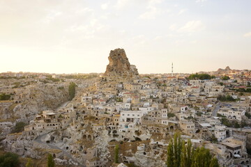 Wall Mural - View of Ortahisar town old houses in rock formations from Ortahisar Castle. Cappadocia. Nevsehir Province. Turkey