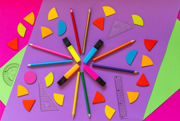 Wall Mural - Multicolored fractions, rulers, pencils, on violet pink green background. Interesting, fun math for kids. Education, back to school concept	