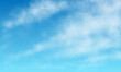 © patila - Weiße Wolkenlandschaft vor blauem Himmel. Panorama Banner Hintergrund.