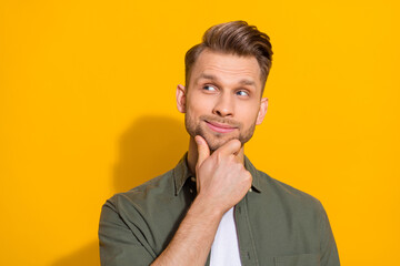 Wall Mural - Portrait of attractive bewildered blond guy overthinking solution copy space isolated over bright yellow color background