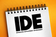 IDE - Integrated Development Environment - software application that provides comprehensive facilities to computer programmers for software development, acronym concept on notepad