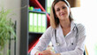 © megaflopp - Portrait of smiling female doctor in clinic