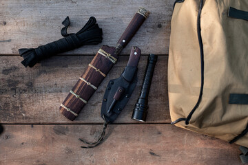 A knife with equipment for survival in the forest