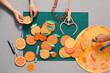 © Marc Tran/Stocksy - DIY concept, making fruit decor with craft tools and supplies