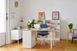 © ALTO IMAGES/Stocksy - Interior of creative home office
