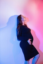 Pregnant Woman In Pink And Blue Light 