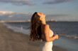 © McKinsey Jordan/Stocksy - Fit Woman Smiles On The Beach
