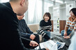 © ZQZ Studio/Stocksy - Group of business people brainstorming during a meeting