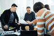 © ZQZ Studio/Stocksy - Group of business people brainstorming during a meeting