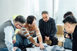 © ZQZ Studio/Stocksy - Group of business people brainstorming during a meeting