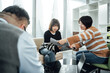 © ZQZ Studio/Stocksy - Group of business people brainstorming during a meeting