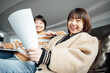© ZQZ Studio/Stocksy - Two casual businesswoman talking in office