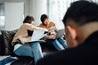© ZQZ Studio/Stocksy - Casual business people discussing in meeting area of office