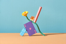 Pink Unbranded Lipstick Balancing On Flower And Game Board