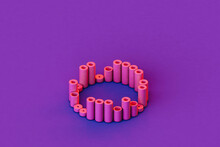 Pink Tubes In A Circle On A Violet Background