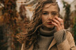 © Olga Moreira/Stocksy - Candid female portrait in autumn