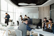 © ZQZ Studio/Stocksy - Business people working in office