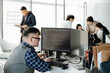 © ZQZ Studio/Stocksy - Business people working in office