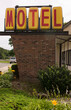 © Raymond Forbes LLC/Stocksy - Vintage Motel Sign with nobody