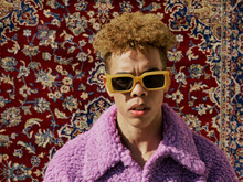 Cool And Confident Young Men With Carpet Background - Colourful Outfit