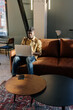 © Sergey Narevskih/Stocksy - Black man browsing laptop during remote work