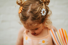 Close Up Of Girl Wearing A White Hair-clip