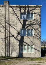 Shadow Of Big Tree On Apartment Building
