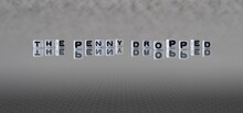 The Penny Dropped Word Or Concept Represented By Black And White Letter Cubes On A Grey Horizon Background Stretching To Infinity