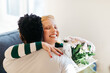 © Studio Firma/Stocksy - Woman Hugging Her Boyfriend