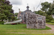 © Raymond Forbes LLC/Stocksy - New England Architecture Landscape with boat and worn shingles