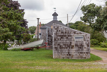 New England Architecture Landscape With Boat And Worn Shingles 