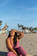 © Jayme Burrows/Stocksy - Laughing at the Beach