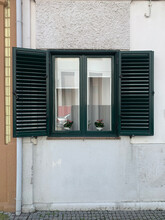 Window With Wooden Shutters