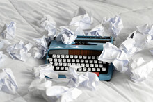 Typewriter With Crumpled Up Paper