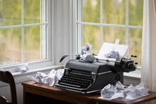 Typewriter With Crumpled Up Paper