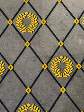 Grey Carpet With Yellow Laurels