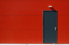 Door In Red Wall
