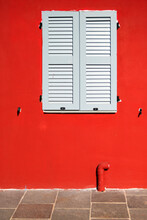 Window On Red Wall
