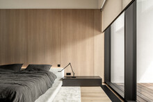 Interior Of Modern Bedroom With Large Windows
