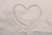 Sea Coast. Inscription Heart On Beach Sand