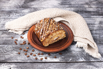 Wall Mural - Cake, roll, on a white wooden background, wooden plate