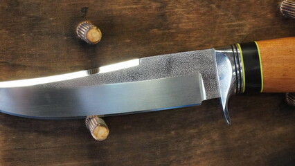 Hunting knife forged from quality steel. Knife is adapted for use in the wild