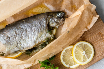 Wall Mural - Baked trout in a butter-lemon sauce