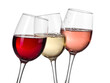 Red, white and rose wine glasses on white background