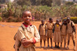 © Media Lens King - Black schoolgirl in the courtyard standing in the foreground compared to her classmates