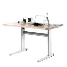 Standing desk with modern devices on white background