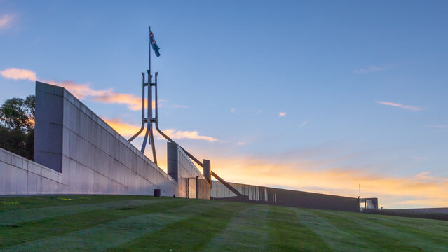 australian parliament house canberra australian capital territory. showing the grassed roof at sunse